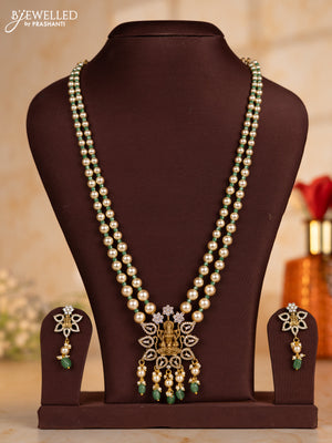 Pearl necklace with teal beads and lakshmi pendant with cz stones and pearl hanging