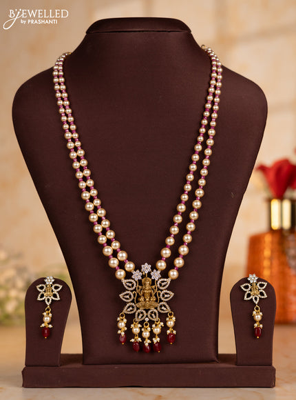 Pearl necklace with pink beads and lakshmi pendant with cz stones and pearl hanging