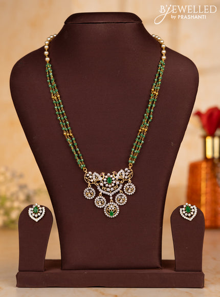 Pearl necklace with green beads and double pendant in cz stones