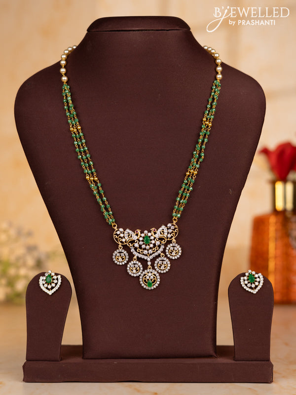 Pearl necklace with green beads and double pendant in cz stones