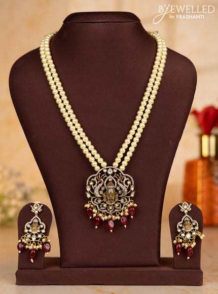 Pearl necklace with tirupathi balaji face pendant and maroon beads hanging