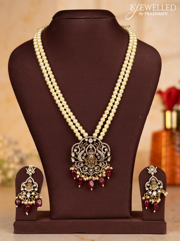 Pearl necklace with tirupathi balaji face pendant and maroon beads hanging