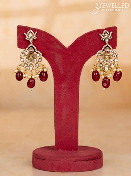 Pearl necklace with tirupathi balaji face pendant and maroon beads hanging