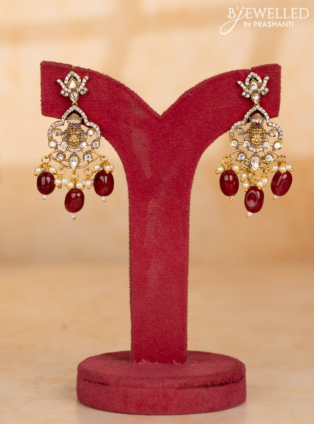 Pearl necklace with tirupathi balaji face pendant and maroon beads hanging
