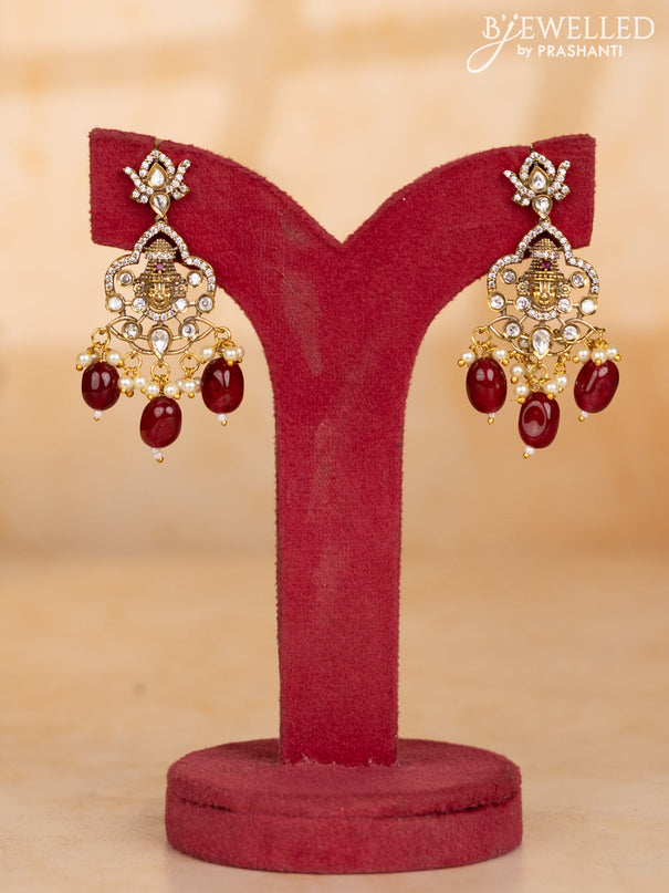 Pearl necklace with tirupathi balaji face pendant and maroon beads hanging