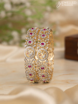 Zircon bangles with ruby and cz stones in gold finish