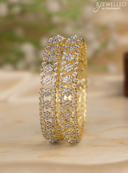 Zircon bangles with cz stones in gold finish