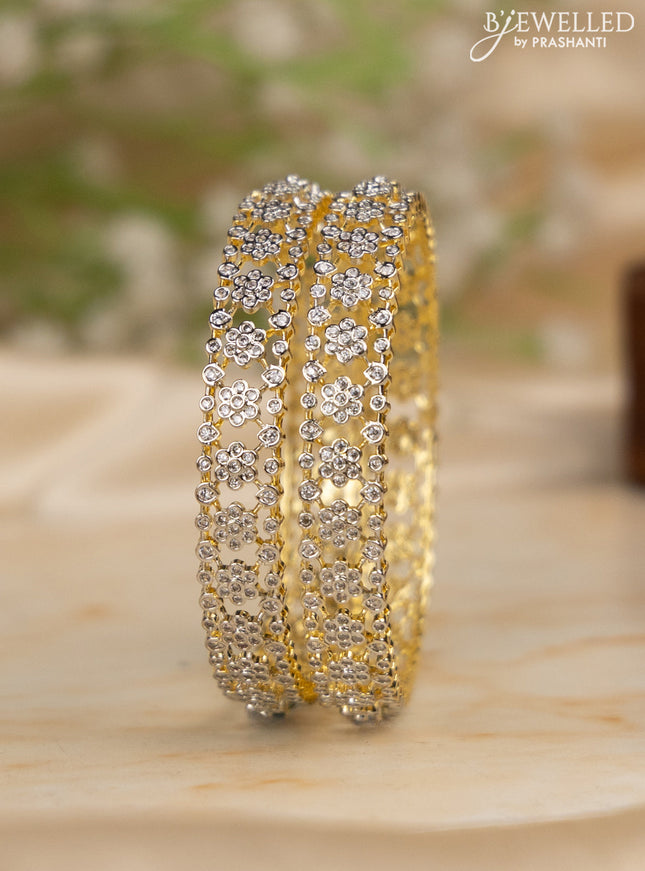 Zircon bangles with cz stones in gold finish