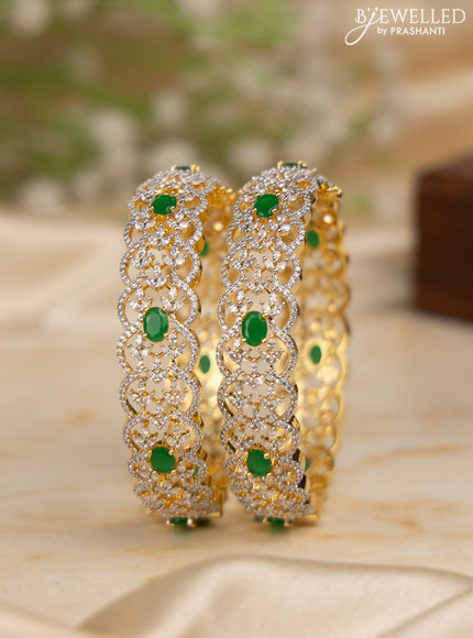 Zircon bangles with emerald and cz stones in gold finish