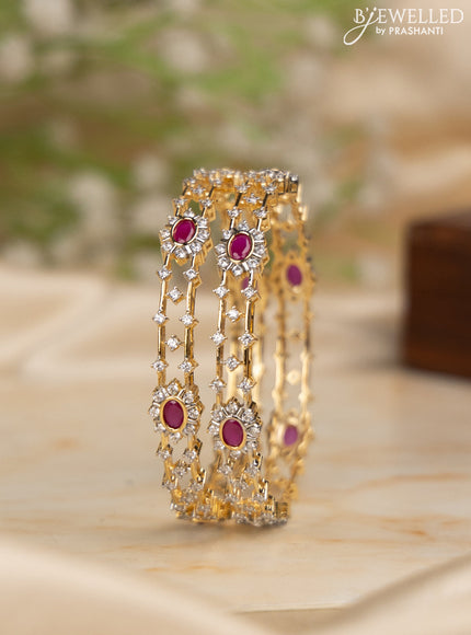 Zircon bangles with ruby and cz stones in gold finish