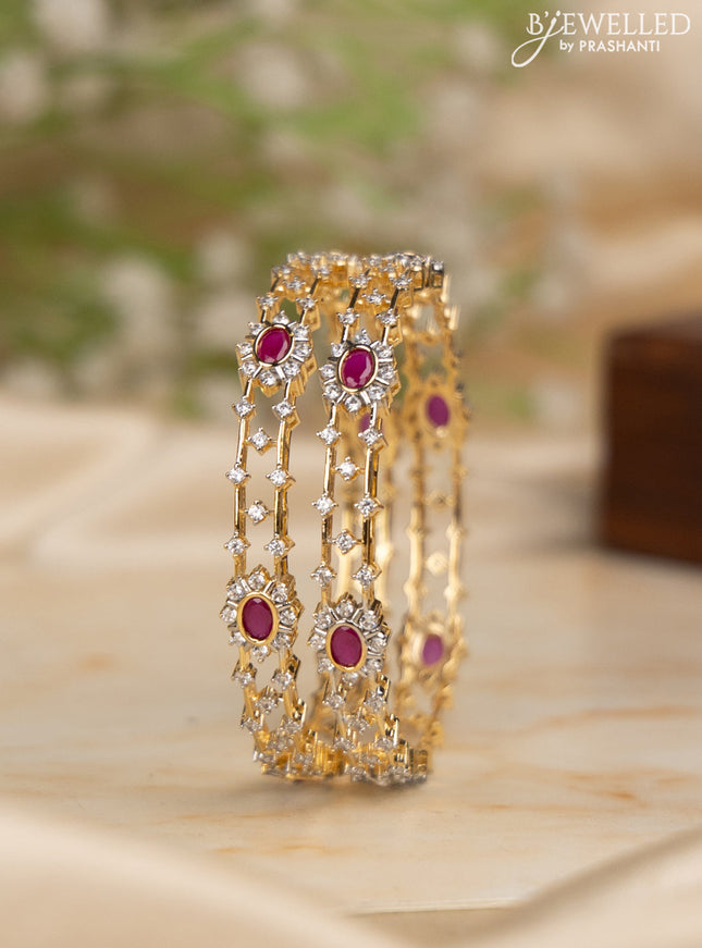 Zircon bangles with ruby and cz stones in gold finish