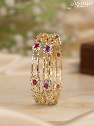 Zircon bangles with ruby and cz stones in gold finish