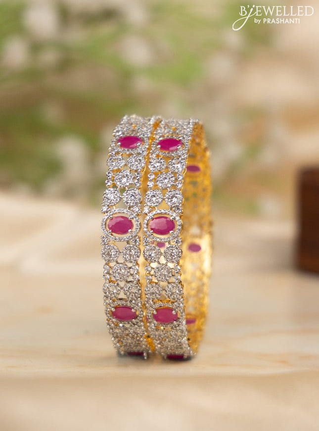 Zircon bangles with ruby and cz stones in gold finish
