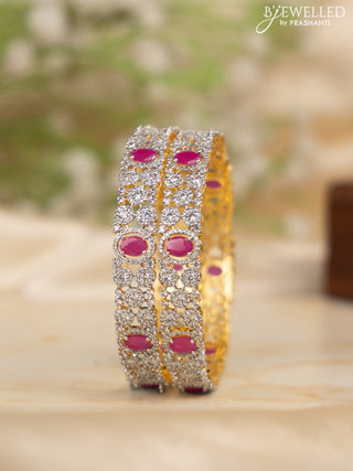 Zircon bangles with ruby and cz stones in gold finish