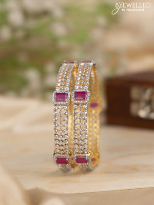 Zircon bangles with ruby and cz stones in gold finish