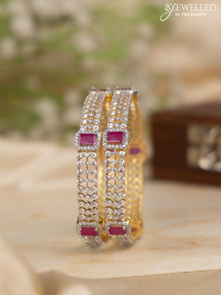 Zircon bangles with ruby and cz stones in gold finish