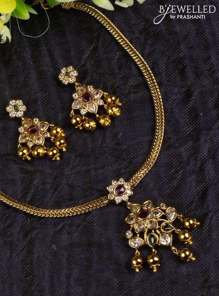 Antique attigai necklace with kemp & kundan stones and golden beads hangings