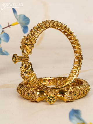 Antique screw type bangles elephant design with green kemp and cz stones