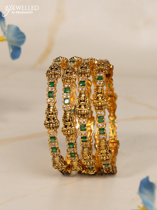 Antique bangles lakshmi design with green kemp and cz stones