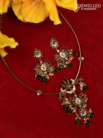 Ring type choker with kemp & cz stones and pearl & green beads hangings