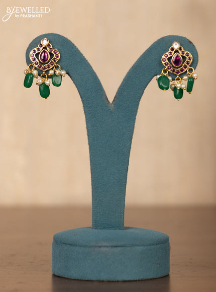 Invisible chain lotus design in multicolor kemp stones and pearl hangings