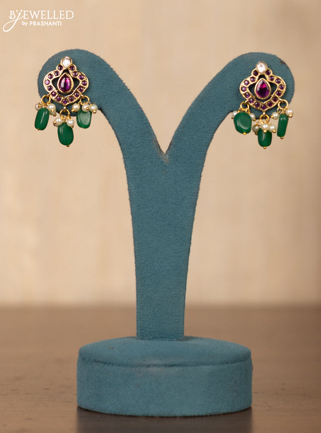 Invisible chain lotus design in multicolor kemp stones and pearl hangings