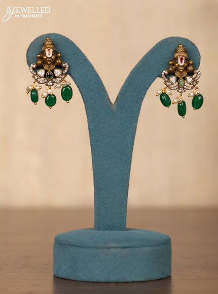Invisible chain tirupati balaji face pendant in green stones and green beads hanging