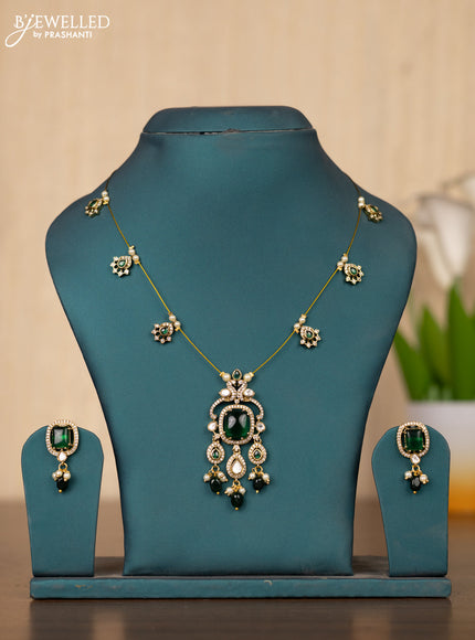 Invisible chain rectangle stone pendant in green stones and green beads hanging