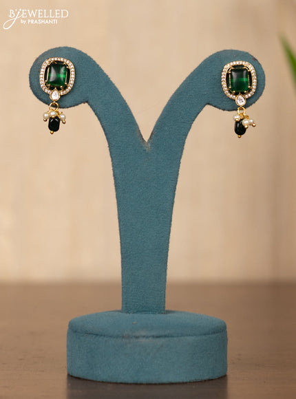 Invisible chain rectangle stone pendant in green stones and green beads hanging