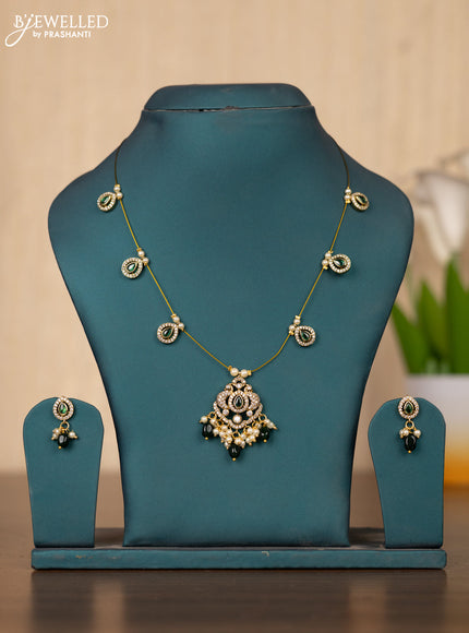 Invisible chain double peacock design in green stones and green beads hanging