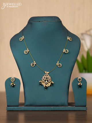 Invisible chain double peacock design in green stones and green beads hanging