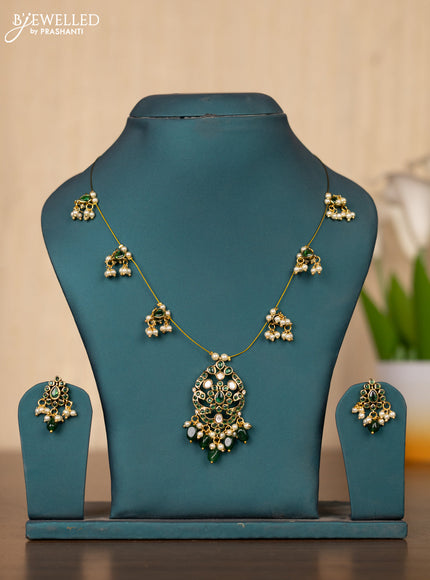 Invisible chain double peacock design in green stones and green beads hanging