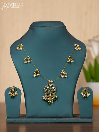 Invisible chain double peacock design in green stones and green beads hanging