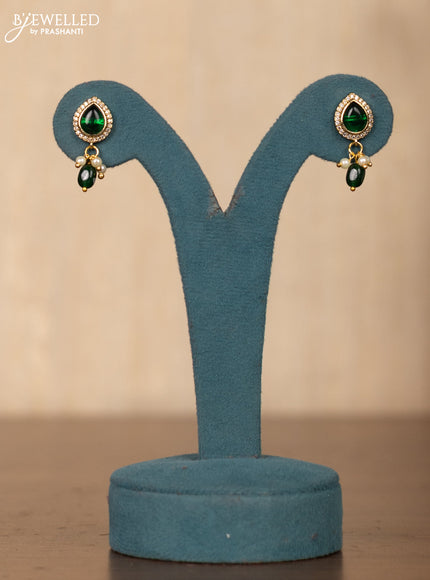 Invisible chain in floral design with green stones