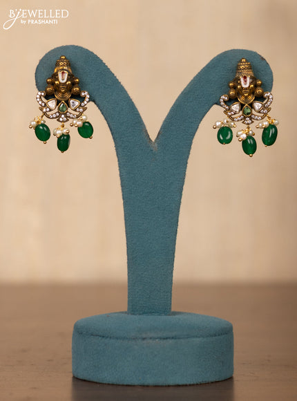 Invisible chain tirupati balaji face pendant in green stones and green beads hanging