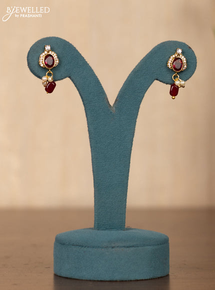 Invisible chain double peacock design in maroon stones and maroon beads hanging