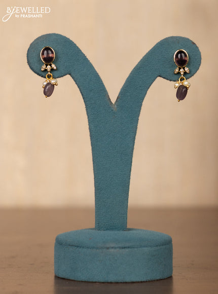 Invisible chain double swan design in purple stones and purple beads hanging