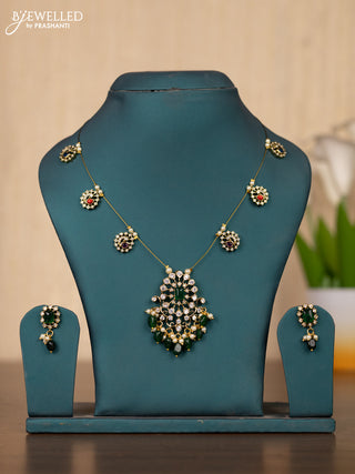 Invisible chain peacock design in multicolor and green stones and green beads hanging