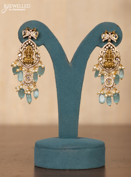 Invisible chain lakshmi design in white stones and blue beads hanging