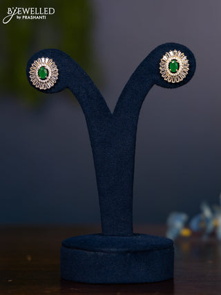 Zircon earring with emerald and cz stones in gold finish