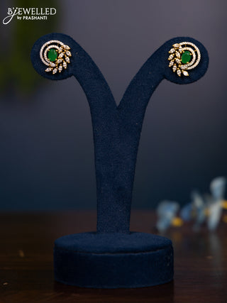 Zircon earring with emerald and cz stones in gold finish