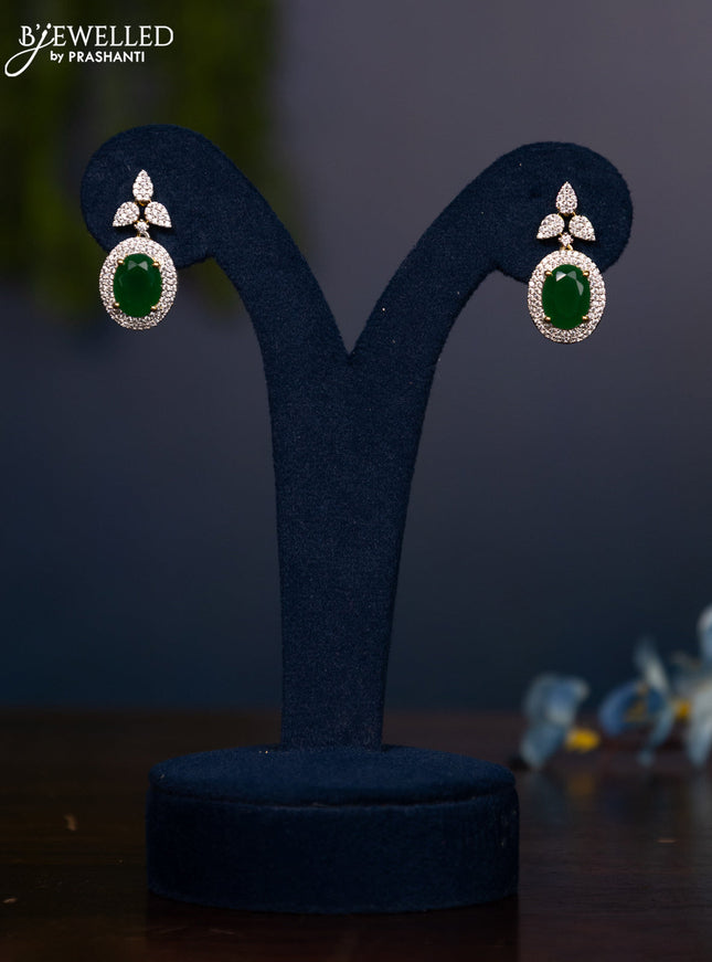 Zircon earring with emerald and cz stones in gold finish