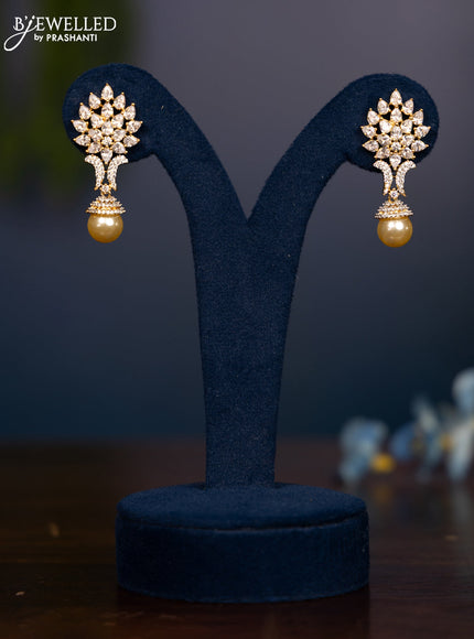 Zircon earring with cz stones and pearl in gold finish