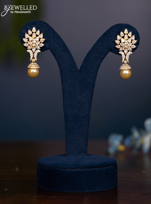 Zircon earring with cz stones and pearl in gold finish