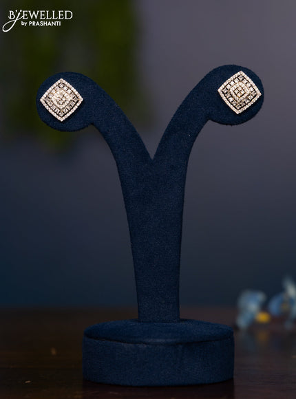 Zircon earring with square shape cz stones in gold finish