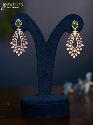 Zircon earrings with tear drop shape in emerald and cz stones