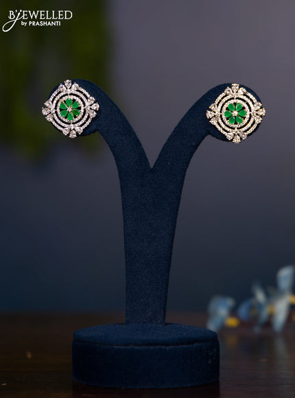 Zircon earring floral design with emerald and cz stones in gold finish