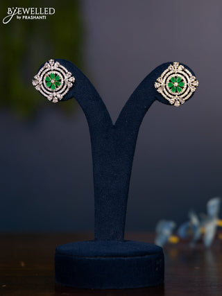 Zircon earring floral design with emerald and cz stones in gold finish