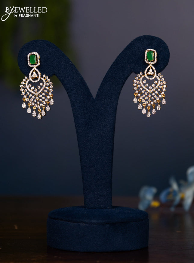 Zircon earring with emerald & cz stones and hangings in gold finish