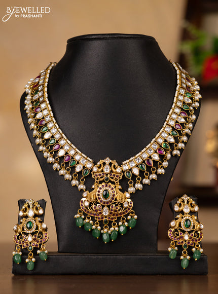 Antique guttapusalu necklace double peacock design in multicolor kemp and kundan stones and rice pearl hangings